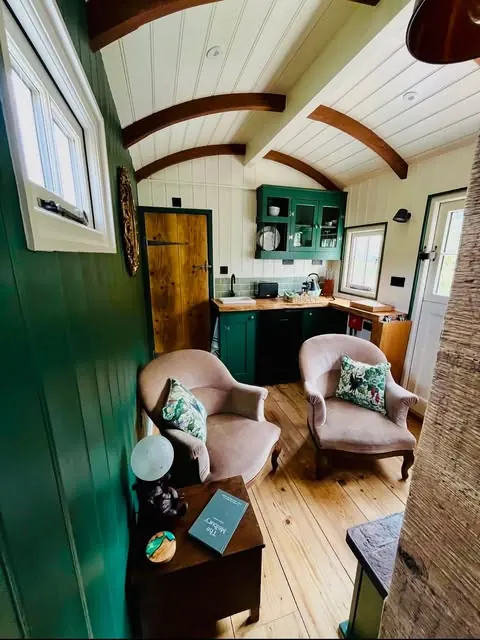 Deep green cottage kitchen decorated by Baines